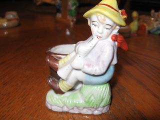 Porcelain Figurine Boy With Flute photo
