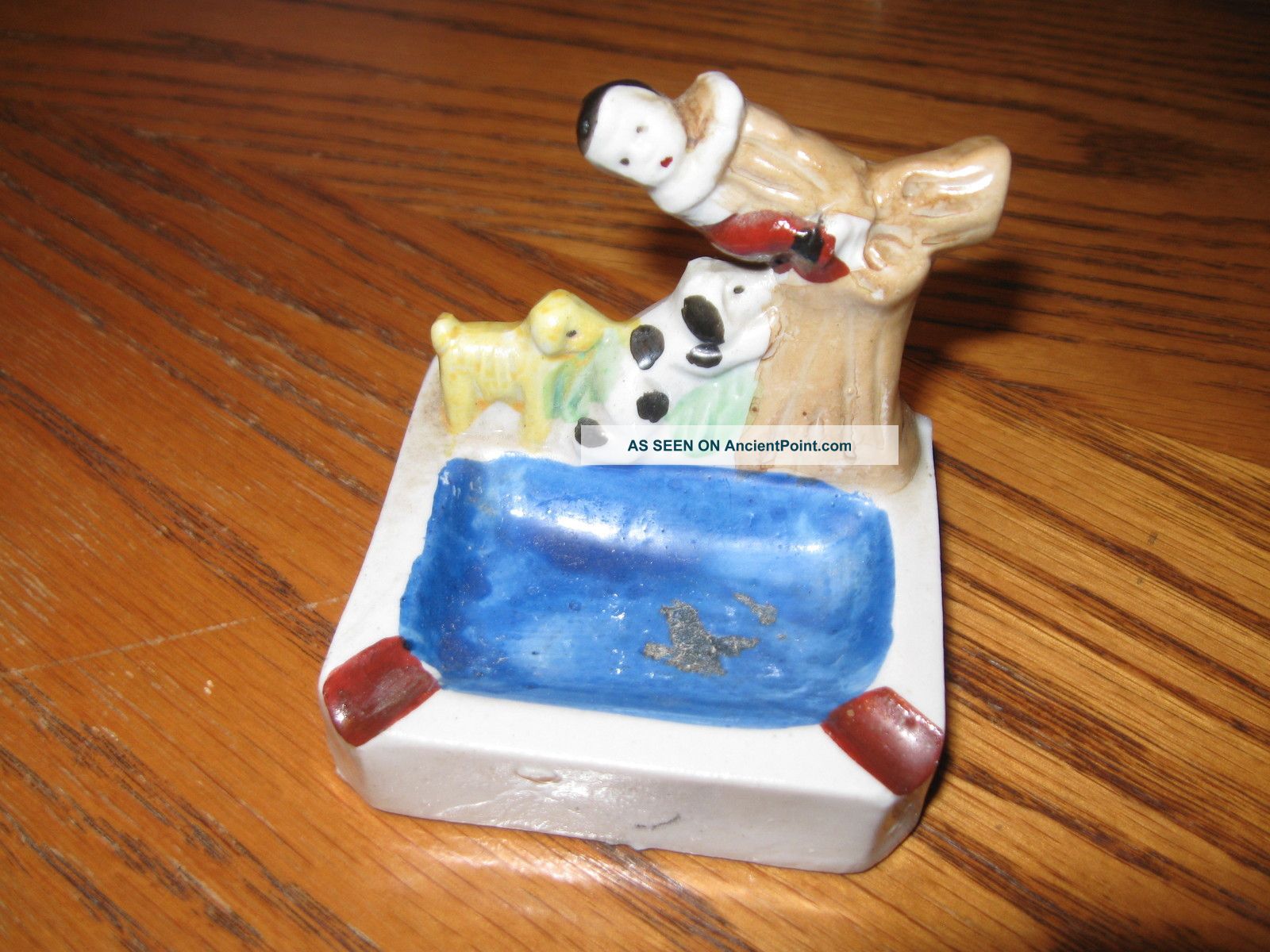 Porcelain Figurine Boy In Tree With Two Dogs Figurines photo