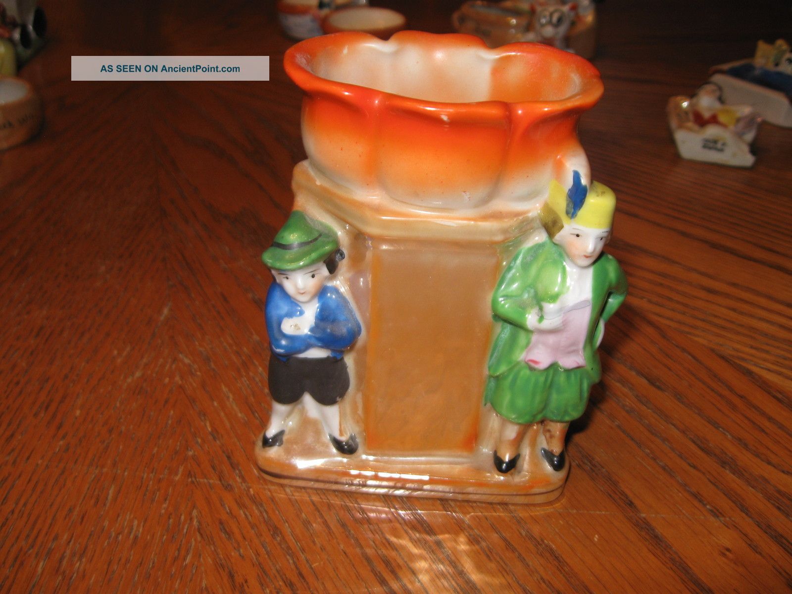 Porcelain Figurine Two Men By Pole Flower Figurines photo