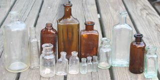 15 Old Antique Brown Clear Green Glass Bottles,  Medicine? Poison? Embossed photo