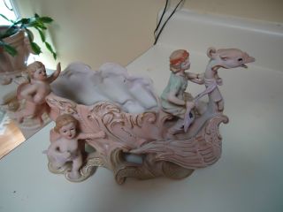 Vintage Hand Painted Bisque Dragon Pulling A Chariot With A Girl & Angels Aboard photo