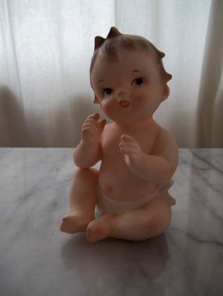 Adorable Piano Baby Bisque Porcelain Figurine photo