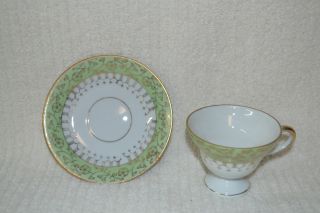 Norleans Japan Teacup With Saucer.  Green And Gold Detail photo