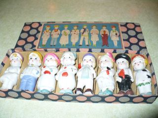 Boxed Set Of 8 Mini Doll Bisque Porcelain,  Stamped Made In Japan Figurines photo