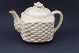 Old Teapot With Lid,  Off White With Basketweave Design And Rose On Lid photo