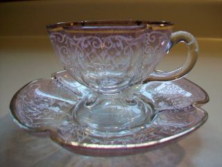 Amethyst To Clear Decorated Cup & Saucer photo