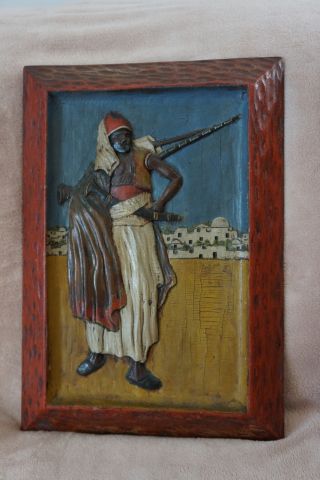 Old Picture Carved In Wood,  African Warrior photo