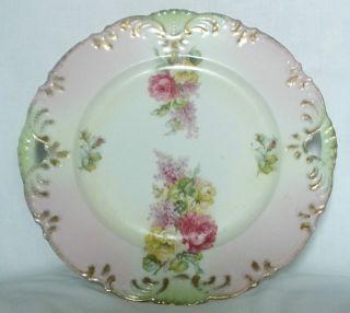 Vintage Cake Plate Wild Flowers Decoration Different Colors On The Border photo