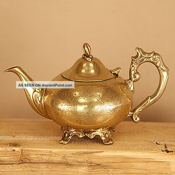 Antique Brass Kettle With Engraved Patterns Metalware photo