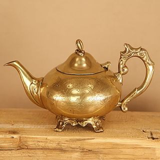 Antique Brass Kettle With Engraved Patterns photo