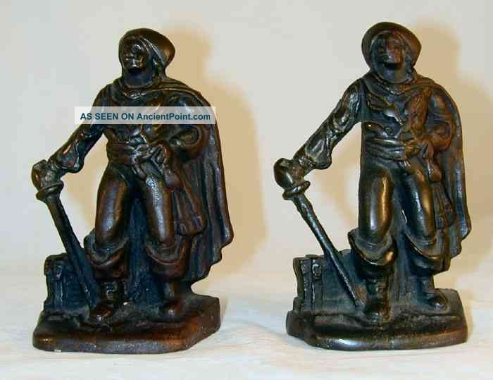 Antique Cast Iron Bookends Warrior Cape Sword Hat Metalware photo