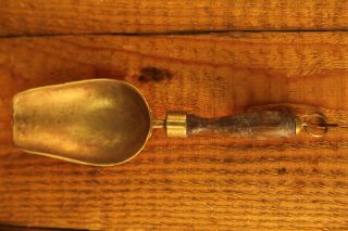 Antique Brass Scoop With Wooden Handle photo