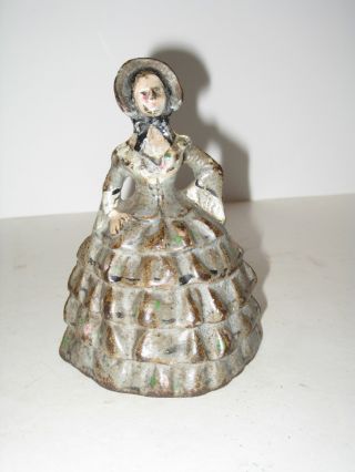 Antique Colonial Woman Cast Iron Doorstop photo