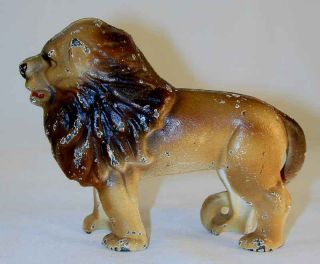 Antique Painted Cast Iron Still Penny Bank Walking Lion With Tail Right photo