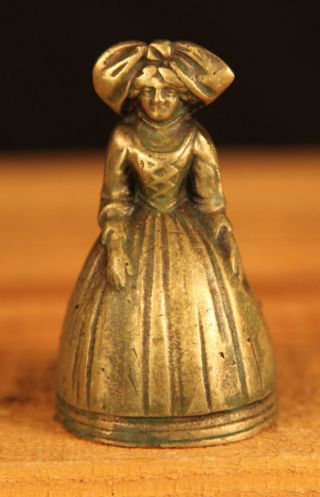 Vintage Brass Desk Bell Lady With Large Head Dress photo