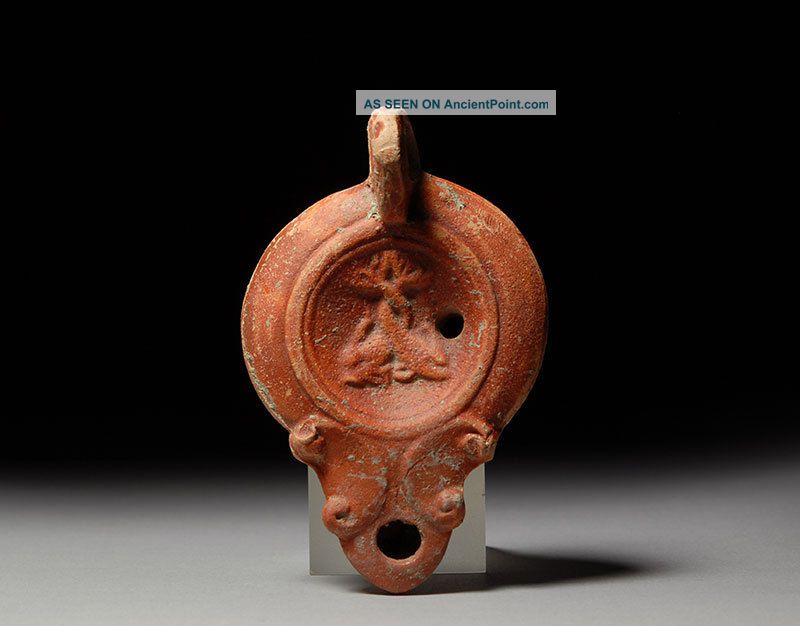 Ancient Roman Terracotta Oil Lamp With Entwined Dolphins 100 A.  D. Roman photo