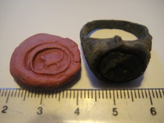 Roman Bronze Ring With A Broken Glass Gem photo