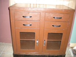Vintage Medical Cabinet By Shampaine In Brown With 4 Drawers And Two Doors photo