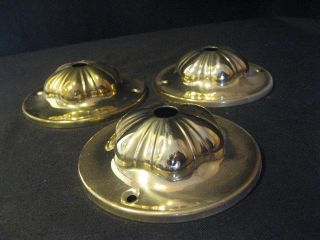 Three Pressed Brass 4 Inch Wide Back Plates. photo