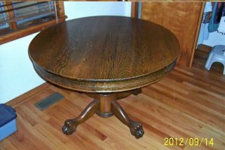 Antique Round Oak Claw Foot Table photo