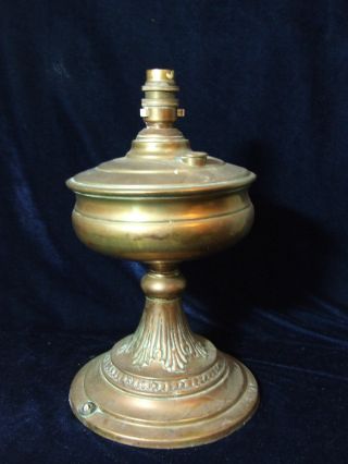 An Antique Brass Oil Lamp Converted To Electricity.  Nr photo