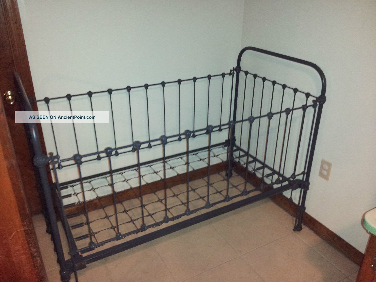 Completely Restored Iron Antique Baby Crib With Detail And Moveable Sides. 1900-1950 photo