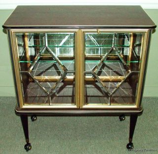 5986: Mid - Century Glass Door Bookcase Display Cabinet On Casters photo