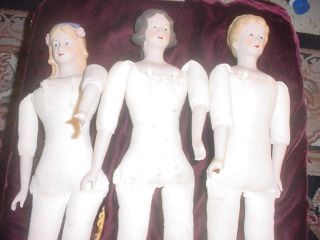 Xmas Three Antique Shoulder And Limb Dolls photo