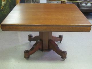 Antique Solid Tiger Oak Dining Table Heavy Base Casters photo