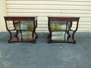 50528 Pair Antique Mahogany 3 Tier Leather Top Tables photo