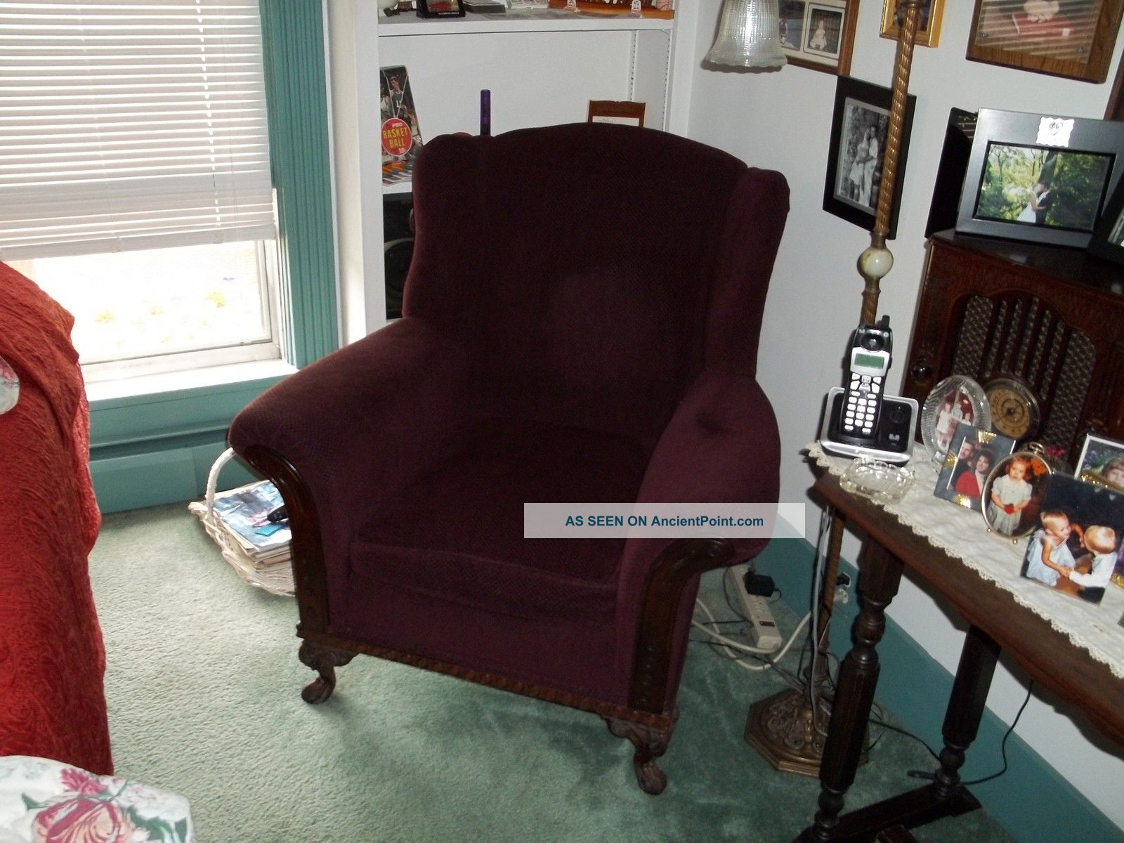 Marroon Antique Chair With Wood Trim 1900-1950 photo