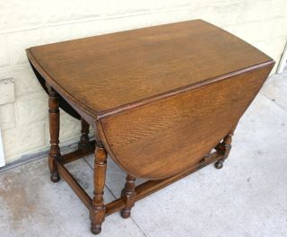 Sturdy English Antique Drop Leaf Table.  Made From Solid Oak. photo