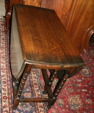 Sturdy English Antique Bobbindrop Leaf Table.  Made From Dark Oak. photo