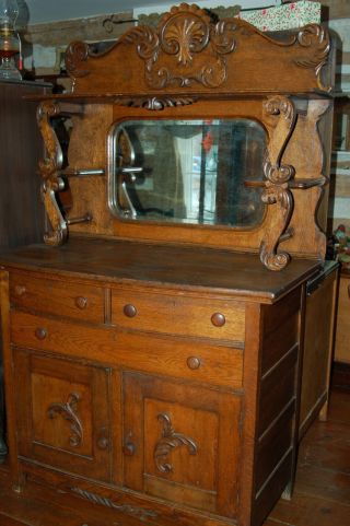 Large Oak Server With Beveled Mirror Applied Carvings photo
