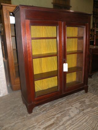 Antique 2 Door Bookcase Cabinet With Wavy Glass photo