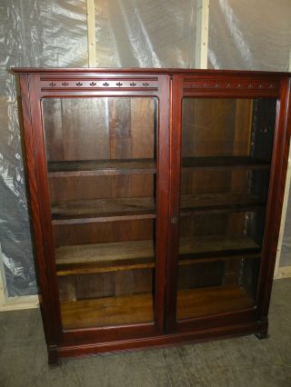 Antique 2 Door Butterprint Bookcase Cabinet With Wavy Glass photo