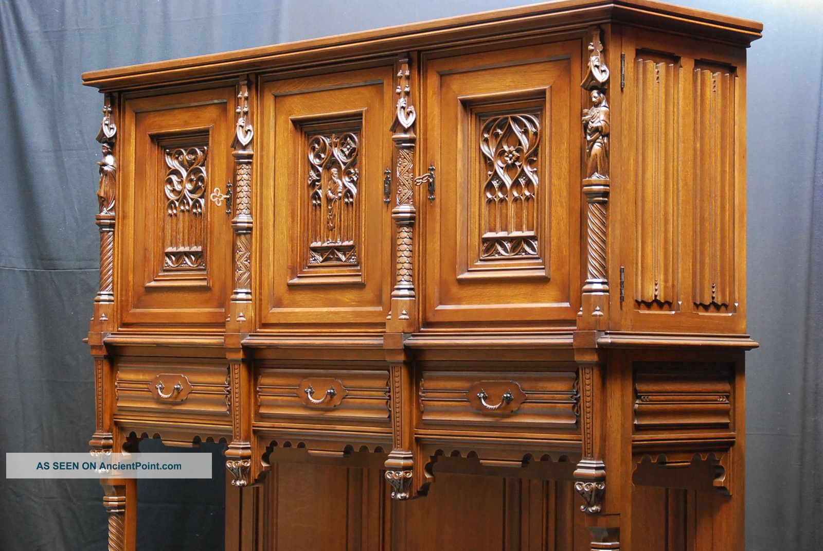 French Gothic Cabinet With Carved Figures 1900-1950 photo