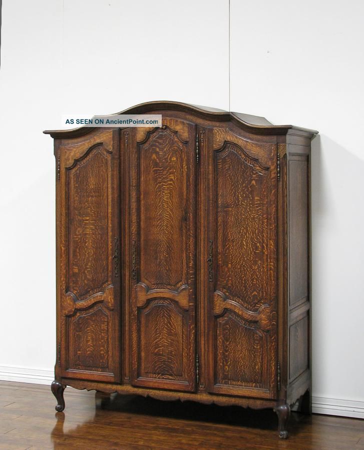 8811000 : Oak French Provincial Three Door Armoire 1900-1950 photo