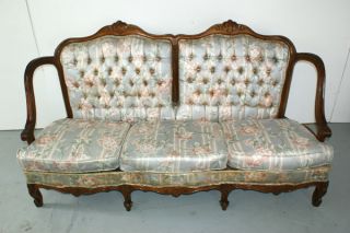 French Louis Xv Style Gilt Sofa With Carved Floral And Scroll Decoration photo