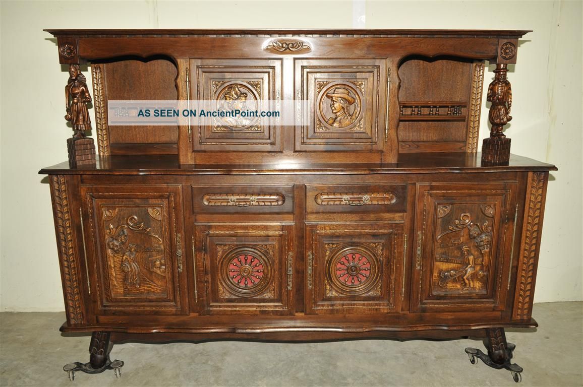 French Breton Cabinet In Oak With Carved Statues Post-1950 photo