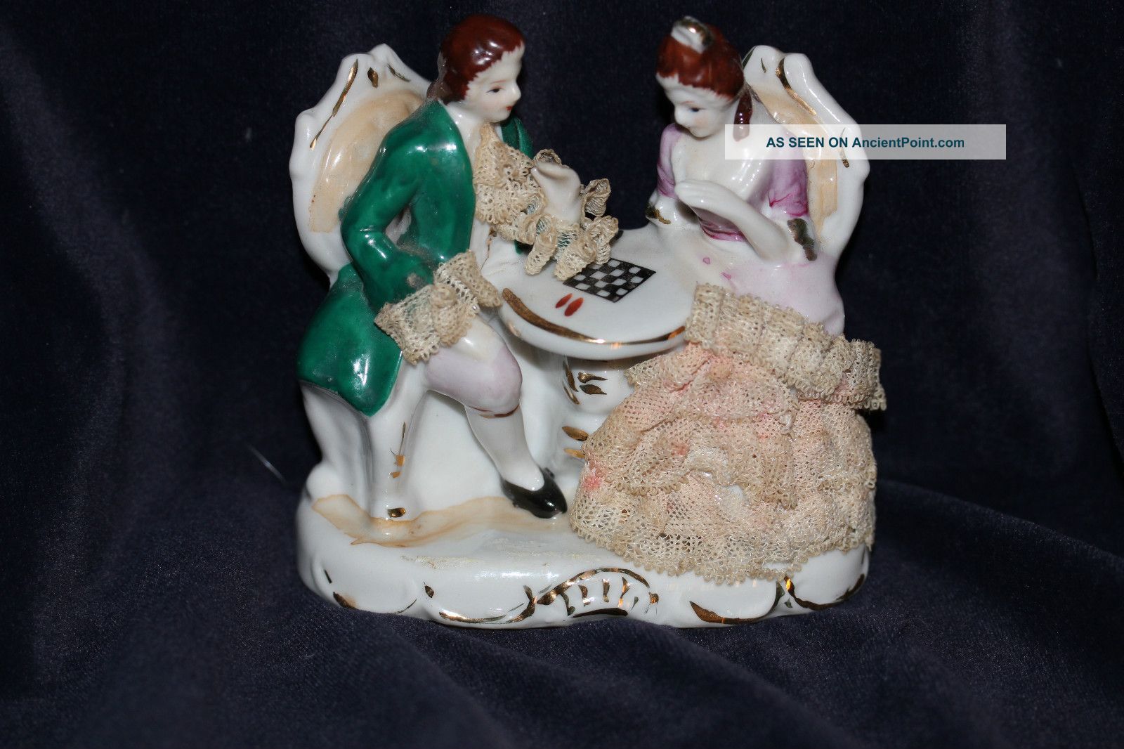 Antique Porcelain Figurine Man And Woman Playing Chess Statue Figurine Figurines photo