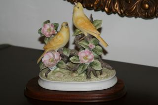 Group Of Canaries Figurine photo