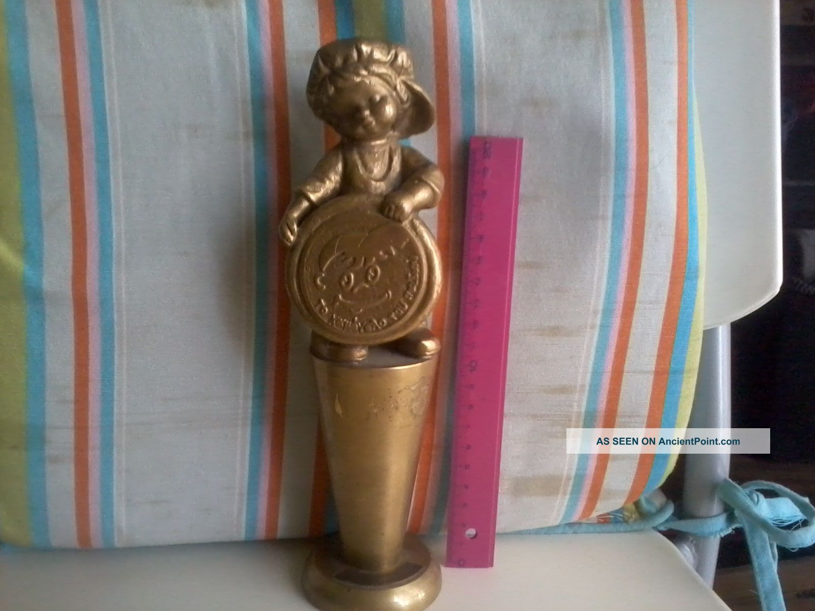 Statuette Of Child ' S Smile Metalware photo