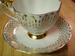 Queen Anne Bone China A Gold Drops Tea Cup & Plate photo