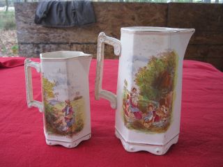 Pair Of Old Matching Pitchers. .  2 Sizes. .  Unusual Find. .  No Lids. .  No Markings photo