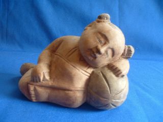 Wooden Carving - Oriental Figure photo