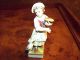 Antique Hand Painted Porcelain Figurine Of Girl Holding Basket Of Grain. Figurines photo 4