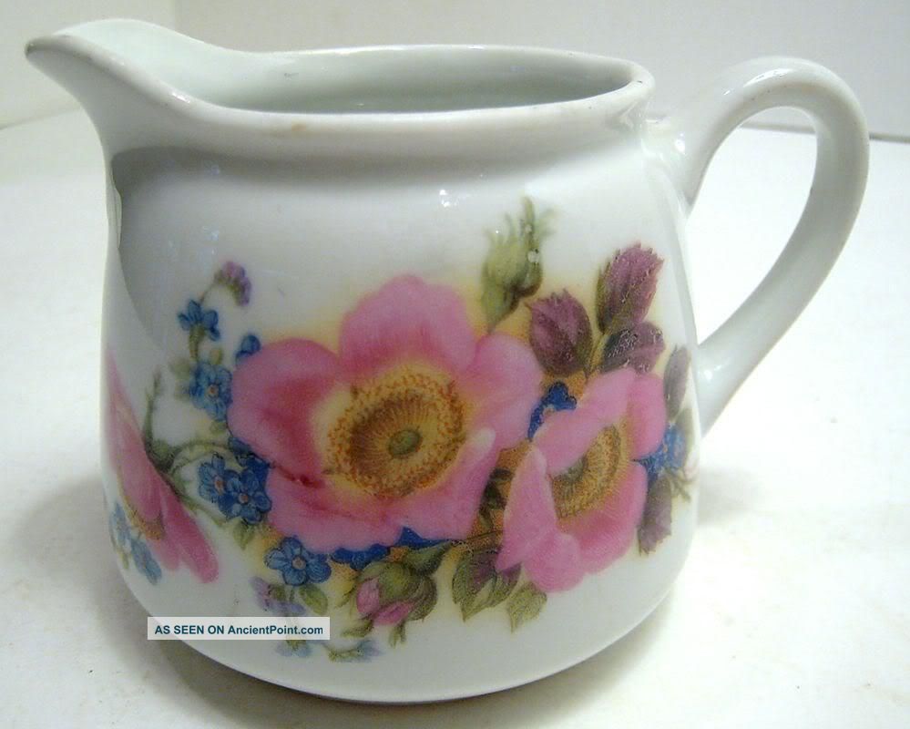 Floral Design Creamer Marked 