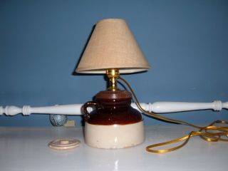 Antique Brown And Cream Jug Repurposed Into A Lamp photo