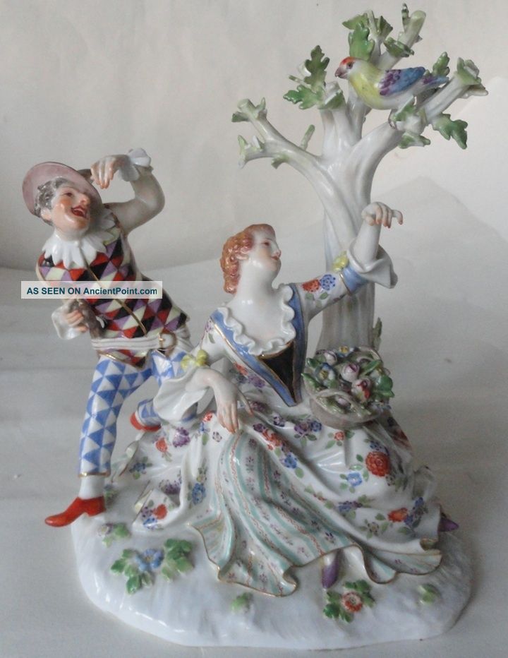 An Antique Meissen Figure Group Of Harlequin And A Lady. Figurines photo